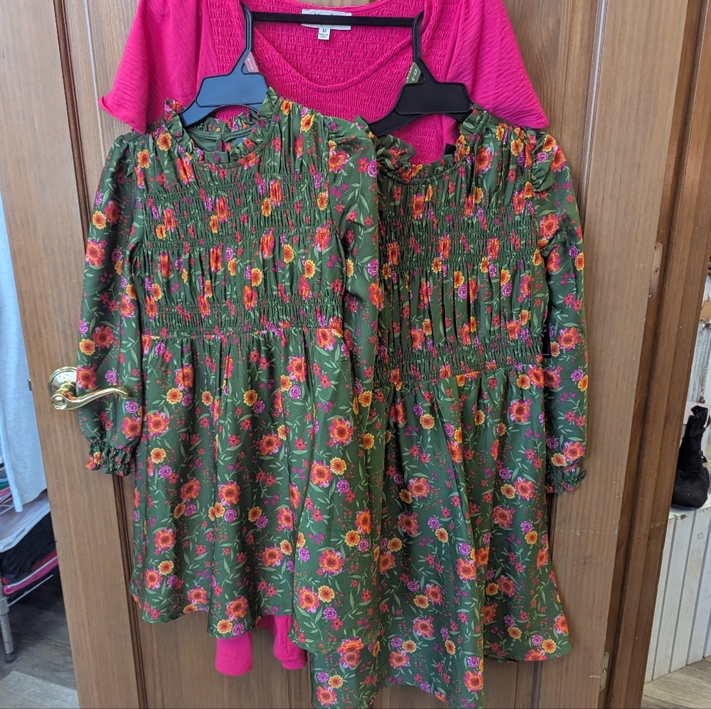 NWTs, Size 7 Floral Long Sleeve Green Smocked Dress.